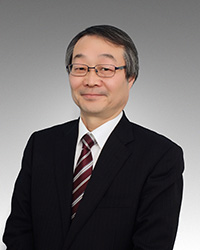 小尾仁公証人の写真